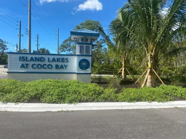 a view of a street sign of a house