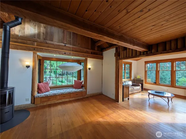 a view of livingroom with furniture and floor to ceiling window