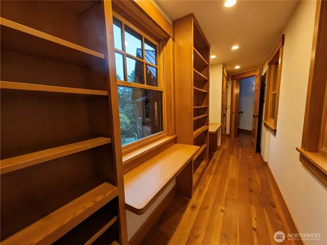 a view of outdoor space with wooden floor and stairs