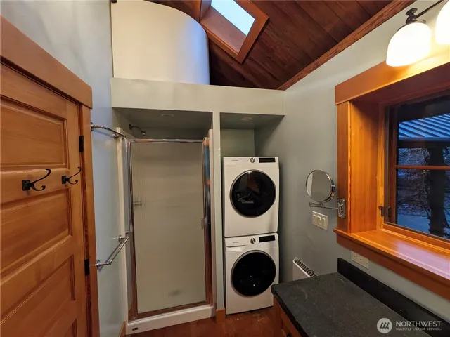 a view of a storage & utility room with washer and dryer