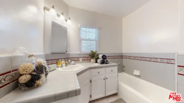 a bathroom with a sink and a bathtub