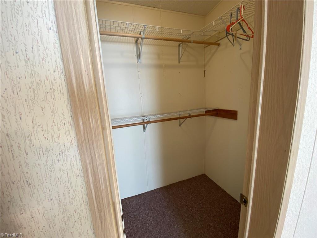 670 Factory Street Ronda, NC 28670 - Photo 19 of 50 Large walk in closet in the primary suite