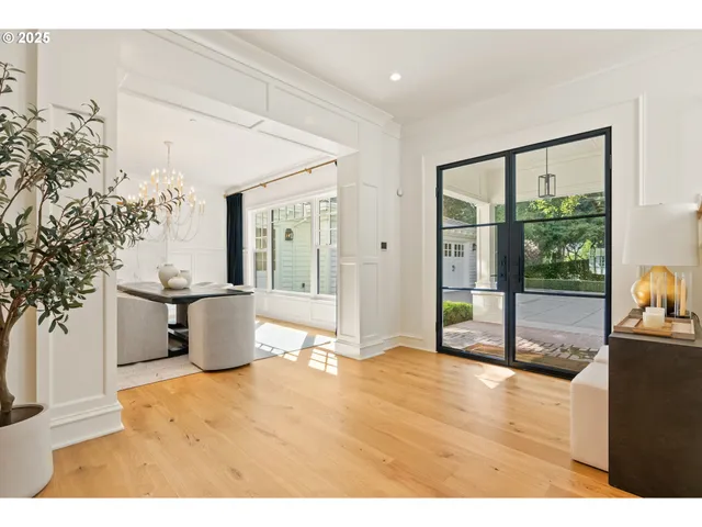 a view of a livingroom with furniture window and wooden floor