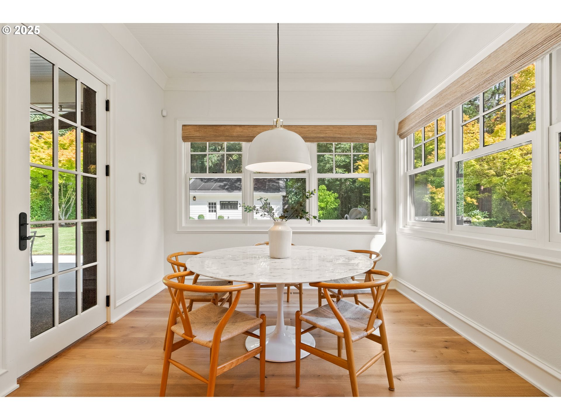 1819 South Radcliffe Road Portland, OR 97219 - Photo 20 of 48 a dining room with furniture a chandelier and wooden floor