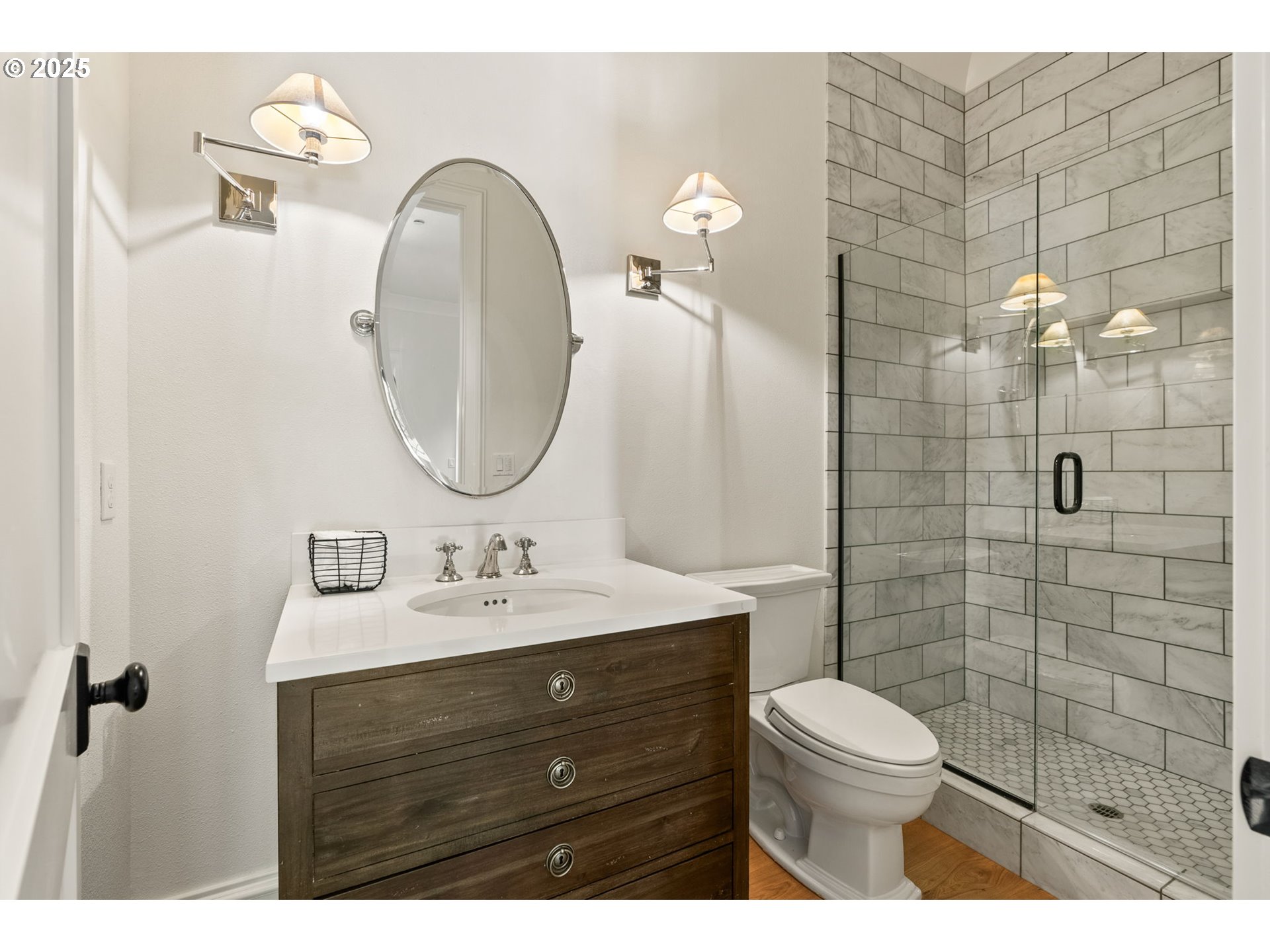 1819 South Radcliffe Road Portland, OR 97219 - Photo 29 of 48 a bathroom with a sink a toilet and shower