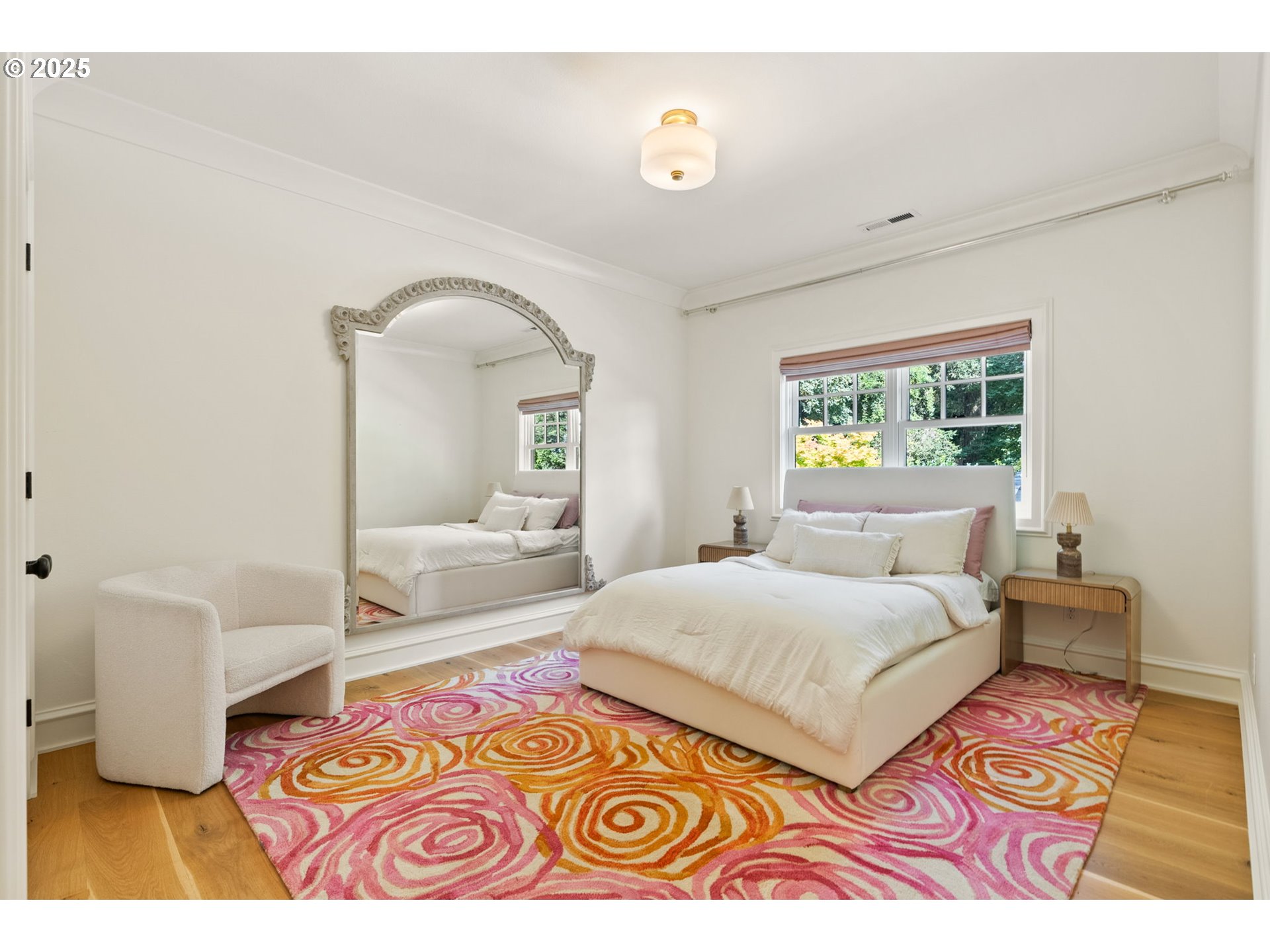 1819 South Radcliffe Road Portland, OR 97219 - Photo 31 of 48 a bedroom with a bed and wooden floor