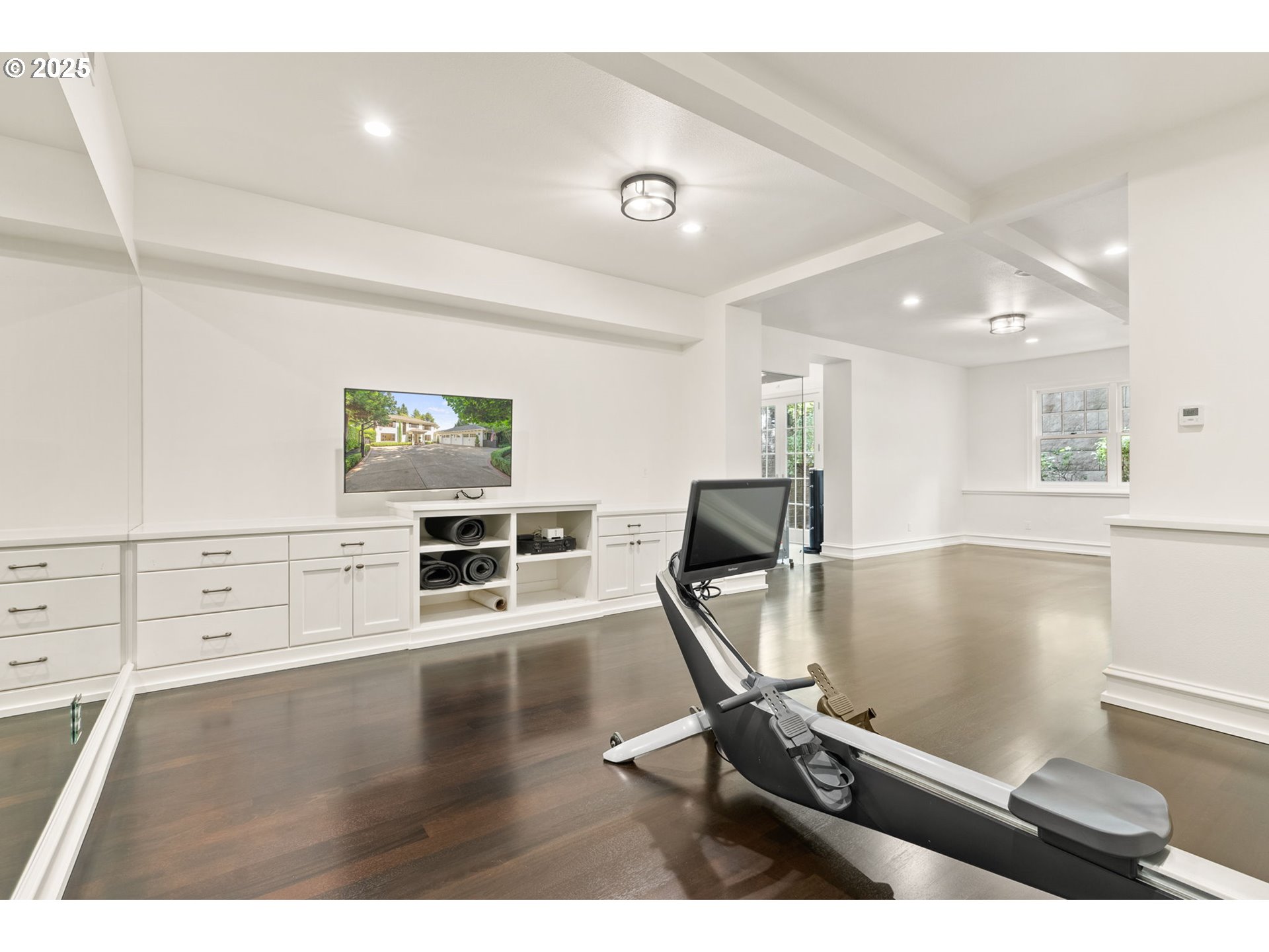 1819 South Radcliffe Road Portland, OR 97219 - Photo 37 of 48 a view of a livingroom with furniture and a flat screen tv
