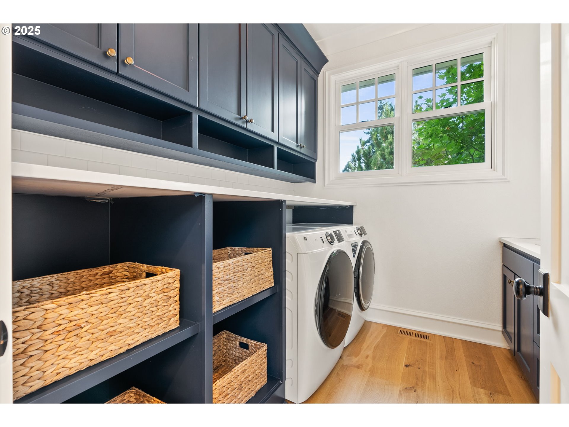 1819 South Radcliffe Road Portland, OR 97219 - Photo 40 of 48 a view of walk in closet with clothes and shoes