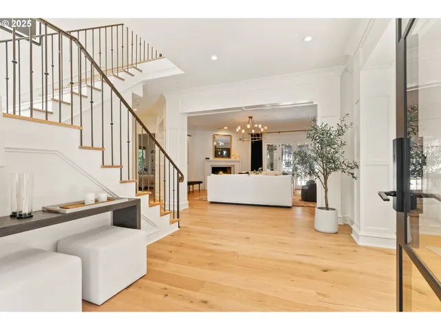 a view of a living room and entryway