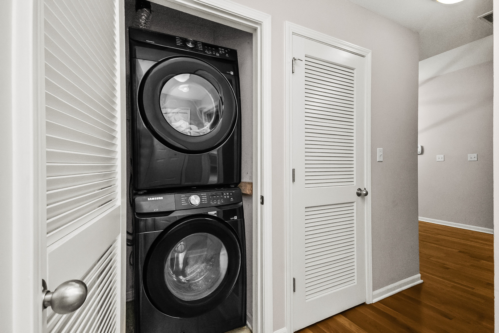 3986 South Drexel Boulevard, Unit 3N Chicago, IL 60653 - Photo 12 of 16 a view of a hallway with washer and dryer