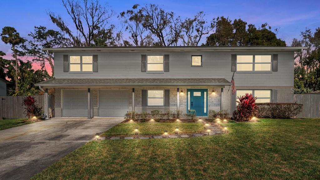 533 Little Wekiva Road Altamonte Springs, FL 32714 - Photo 1 of 1 a front view of a house with a yard