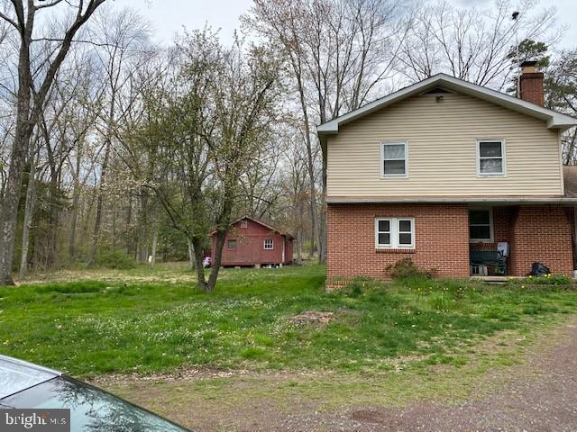 5152 Hiffletrayer Road Green Lane, PA 18054 - Photo 2 of 24 a house that has a lot of windows in it