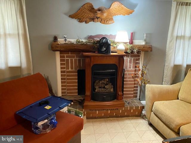 5152 Hiffletrayer Road Green Lane, PA 18054 - Photo 11 of 24 a living room with furniture and a fireplace