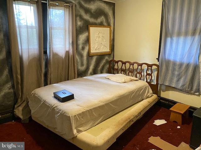 5152 Hiffletrayer Road Green Lane, PA 18054 - Photo 12 of 24 a bedroom with a bed and wooden floor
