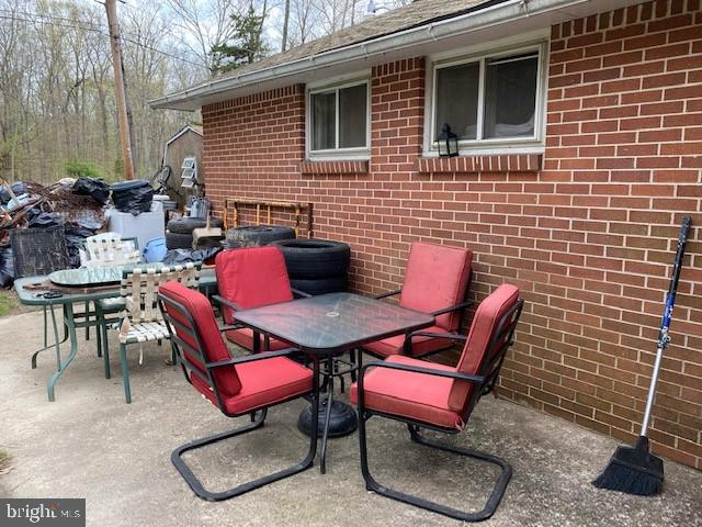 5152 Hiffletrayer Road Green Lane, PA 18054 - Photo 21 of 24 a patio with a table and chairs