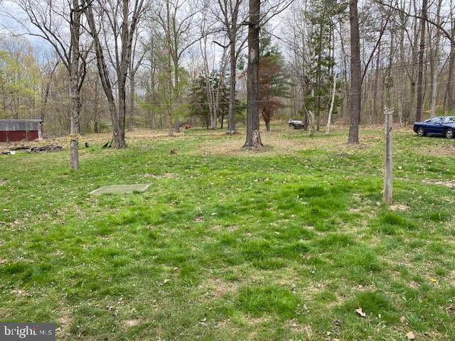 5152 Hiffletrayer Road Green Lane, PA 18054 - Photo 23 of 24 a view of outdoor space with deck and trees