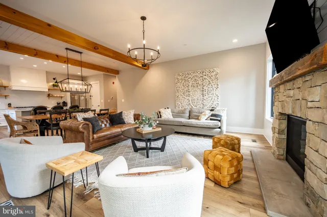 a bedroom with a bed and a lamp with window