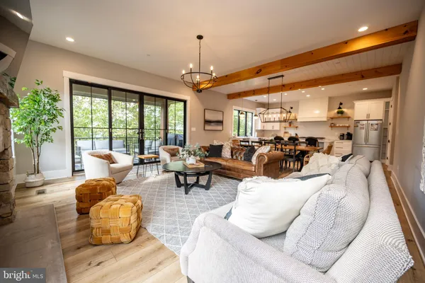 a bed room with a bed and a chair