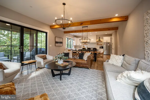 a bedroom with a bed and a flat tv screen