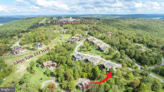 a kitchen with a stove a sink and a microwave