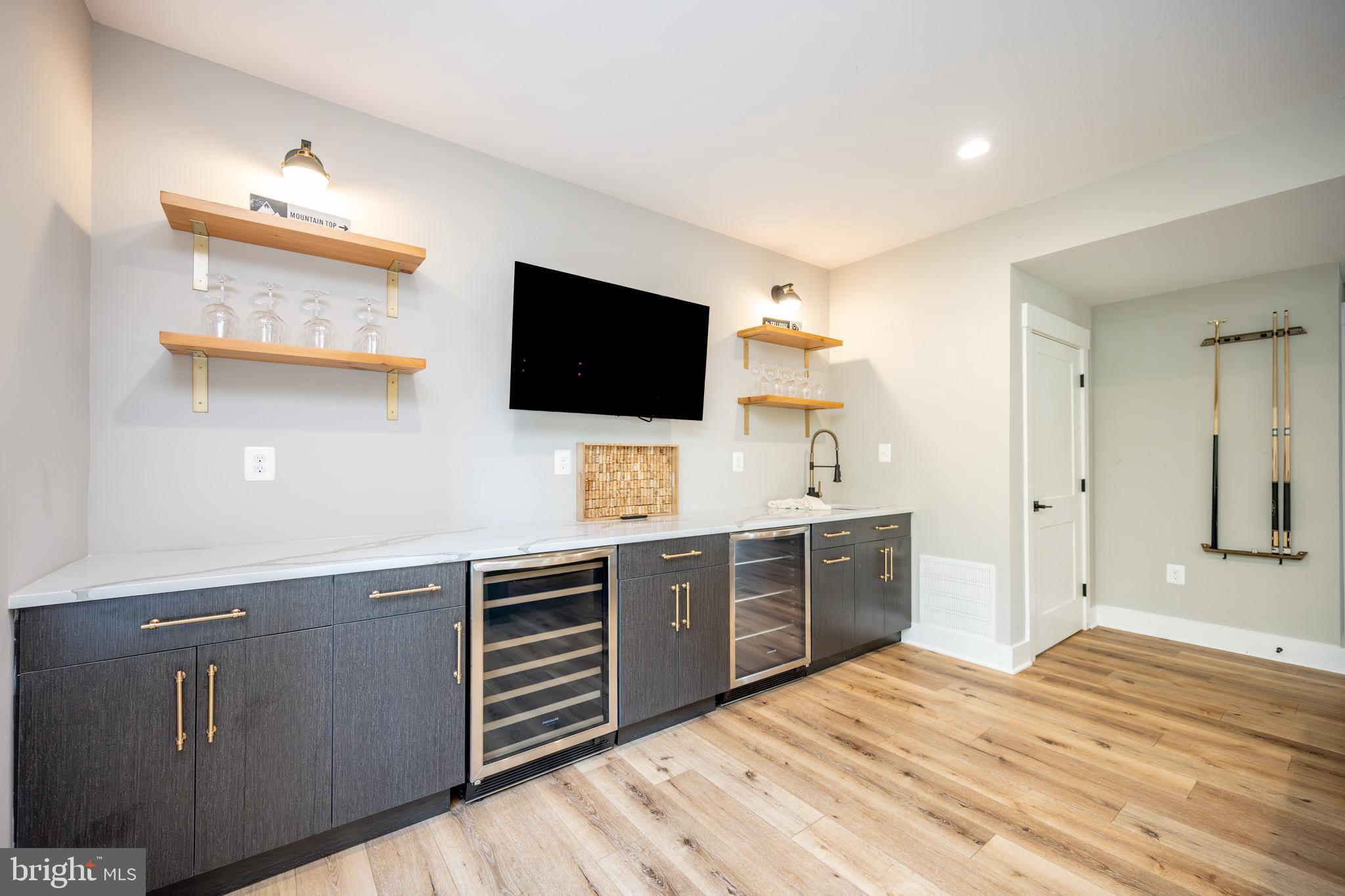 152 Ridge Run Road McHenry, MD 21541 - Photo 83 of 100 a kitchen with a sink and a stove top oven