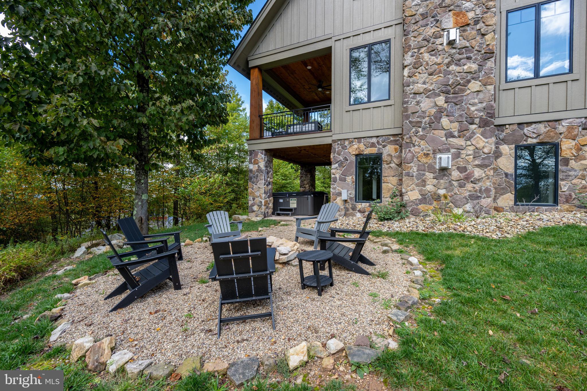 152 Ridge Run Road McHenry, MD 21541 - Photo 95 of 100 a view of a house with backyard and sitting area