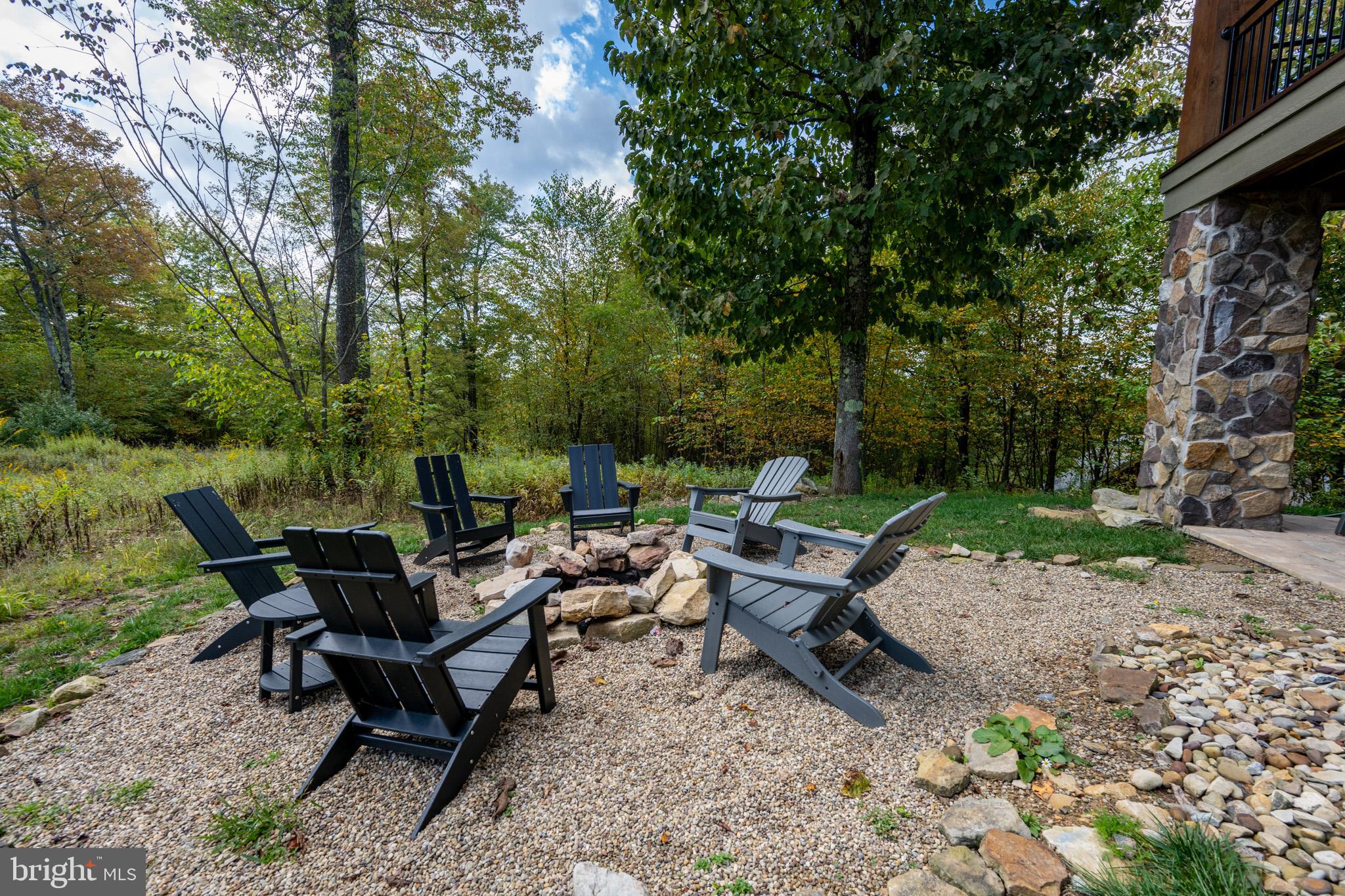 152 Ridge Run Road McHenry, MD 21541 - Photo 96 of 100 a view of a sitting area with furniture and wooden floor