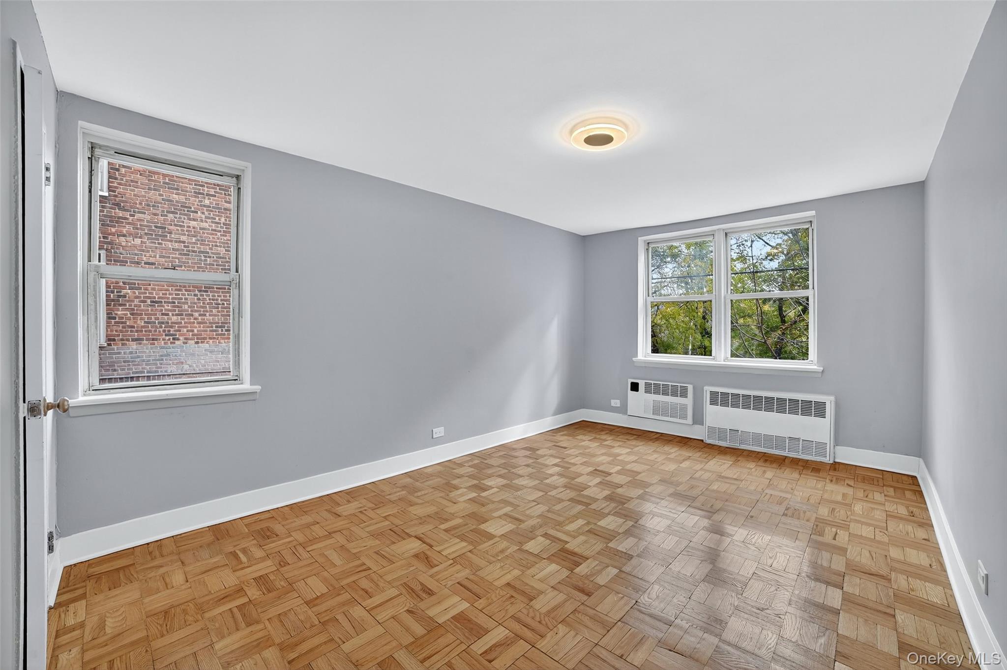 4295 Webster Avenue, Unit 1D Bronx, NY 10470 - Photo 19 of 21 a view of an empty room with a window