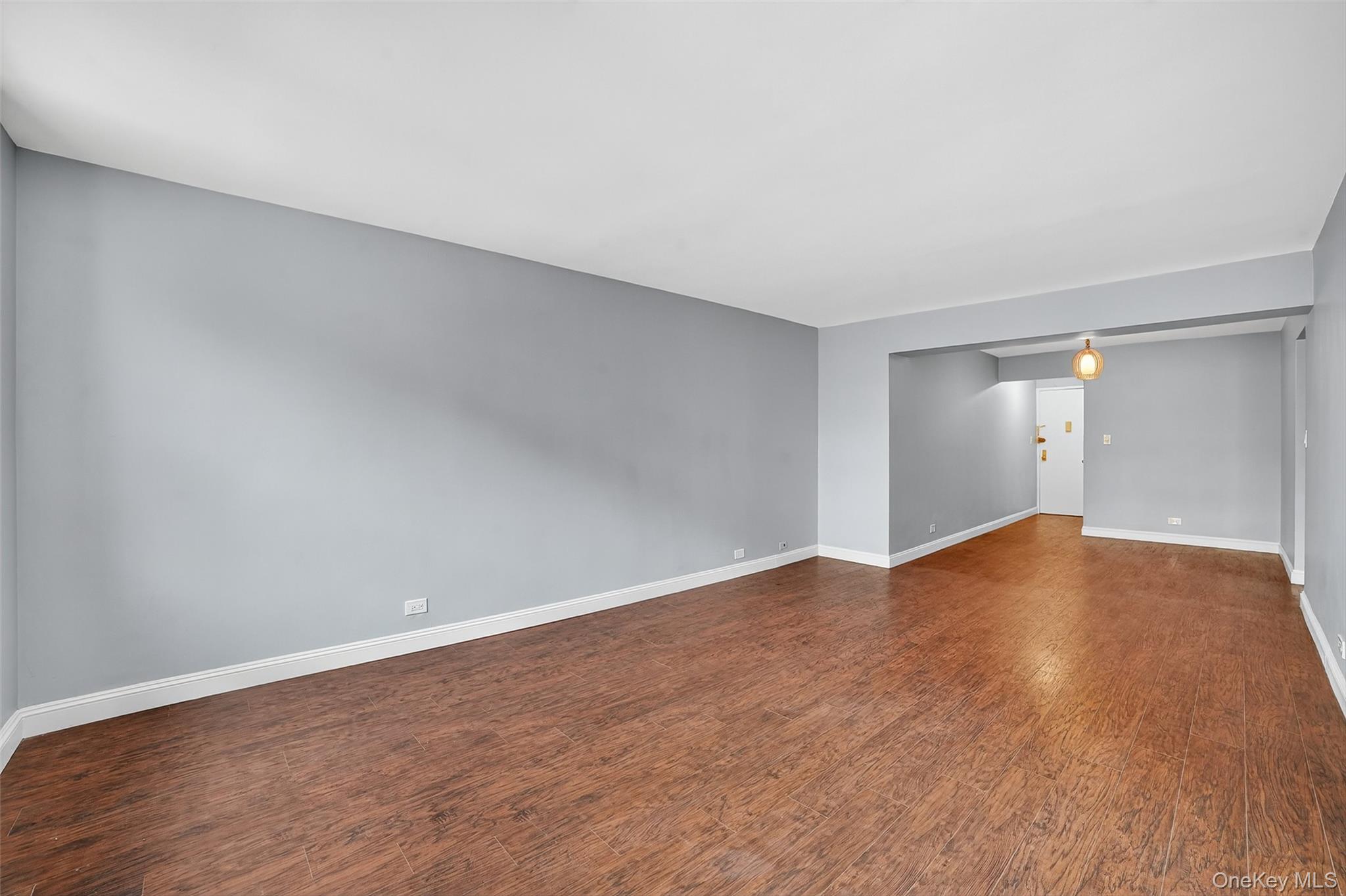 4295 Webster Avenue, Unit 1D Bronx, NY 10470 - Photo 7 of 21 a view of empty room with wooden floor