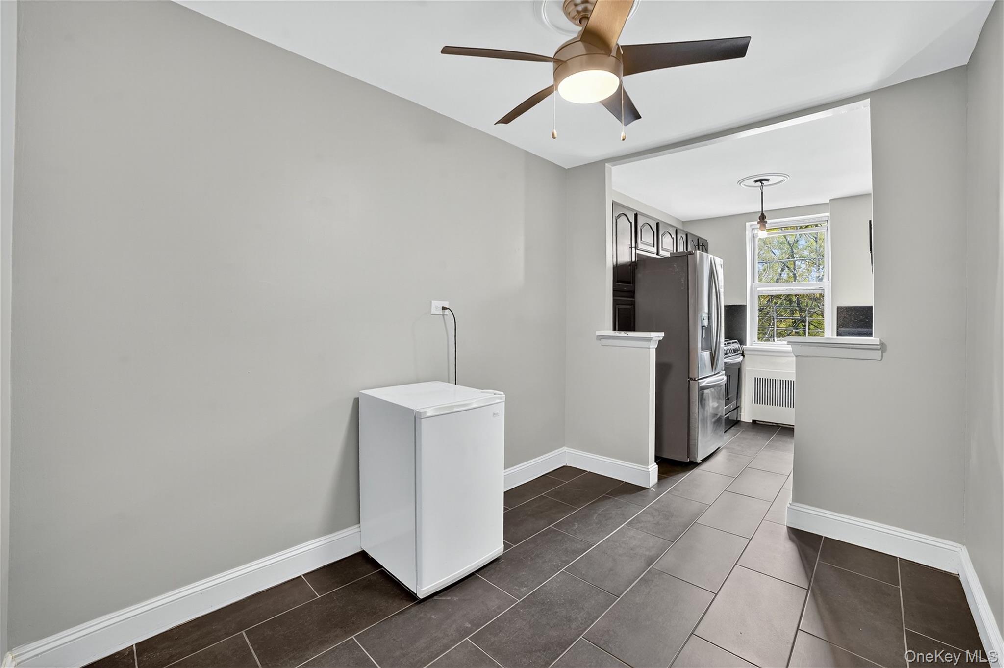 4295 Webster Avenue, Unit 1D Bronx, NY 10470 - Photo 10 of 21 a view of a hallway with entryway and chandelier