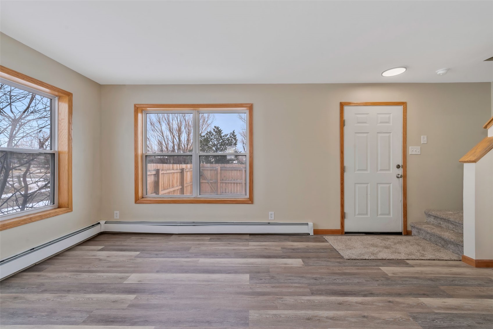 401 South 3rd Street, Unit 401 Hayden, CO 81639 - Photo 13 of 38 a view of an empty room with wooden floor and a window