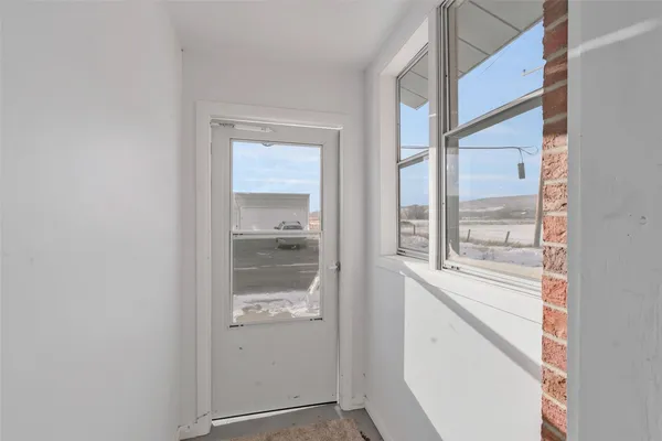 a view of bathroom with a window