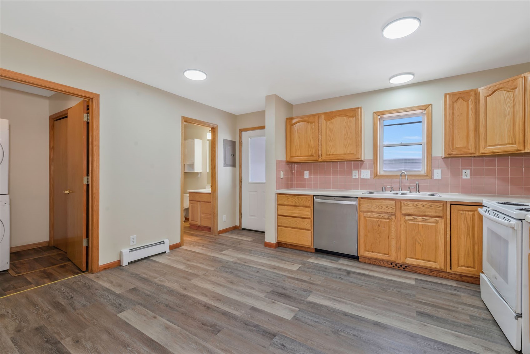 401 South 3rd Street, Unit 401 Hayden, CO 81639 - Photo 4 of 38 a kitchen with granite countertop wooden floors and granite counter tops