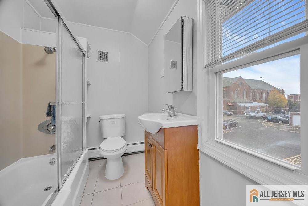 34 Maple Avenue Edison, NJ 08837 - Photo 12 of 20 a bathroom with a sink toilet and shower