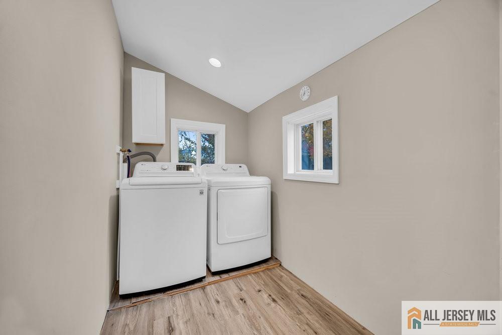 34 Maple Avenue Edison, NJ 08837 - Photo 19 of 20 a utility room with dryer and washer