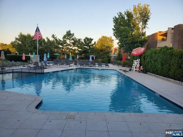 a view of a lake with a house in the background