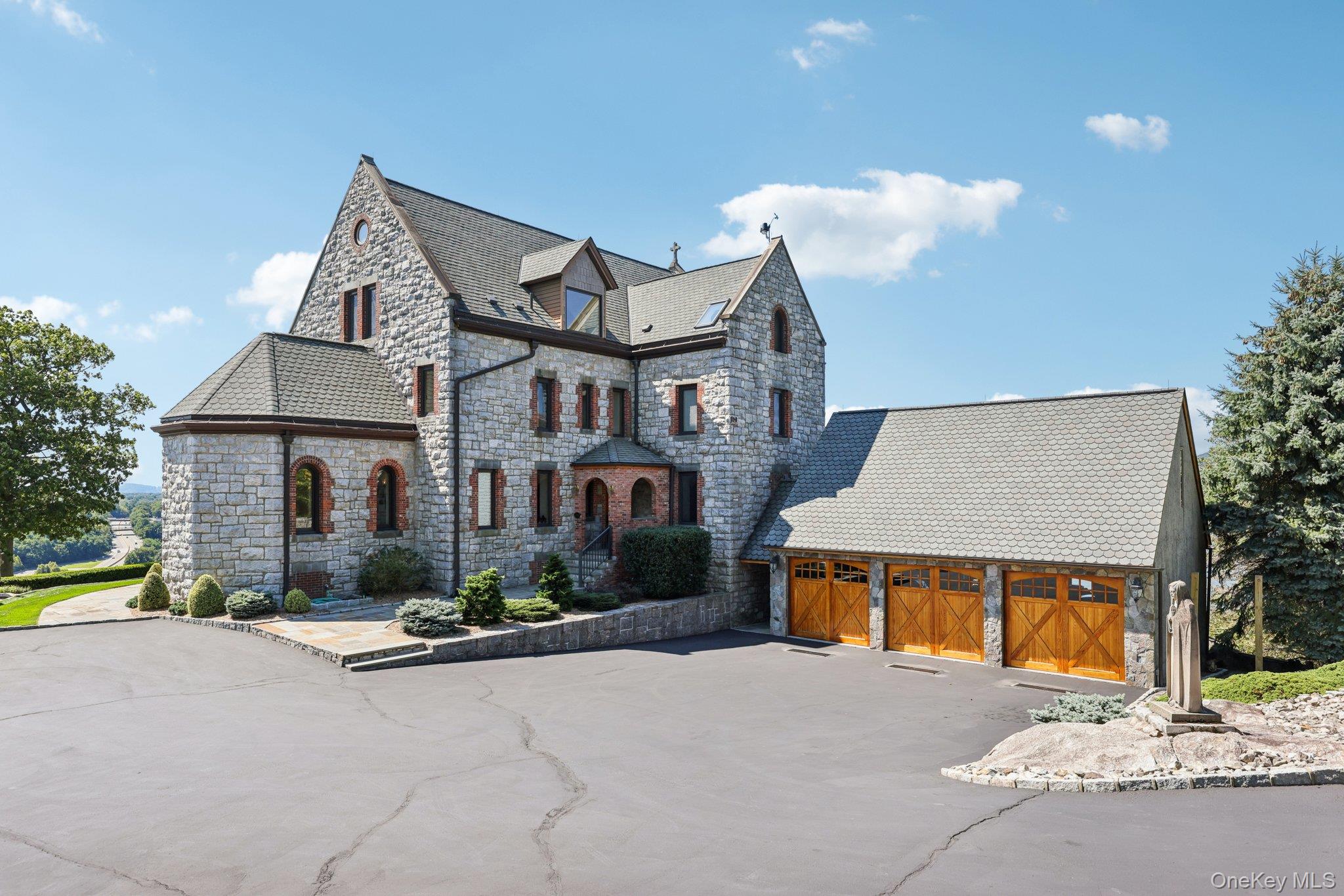 1 St Mary's Convent Peekskill, NY 10566 - Photo 6 of 49 a front view of a house with a yard and garage