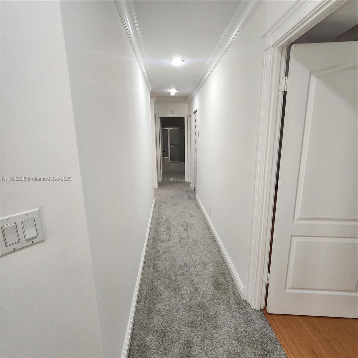 11281 Reveille Road Cooper City, FL 33026 - Photo 17 of 42 a view of a hallway