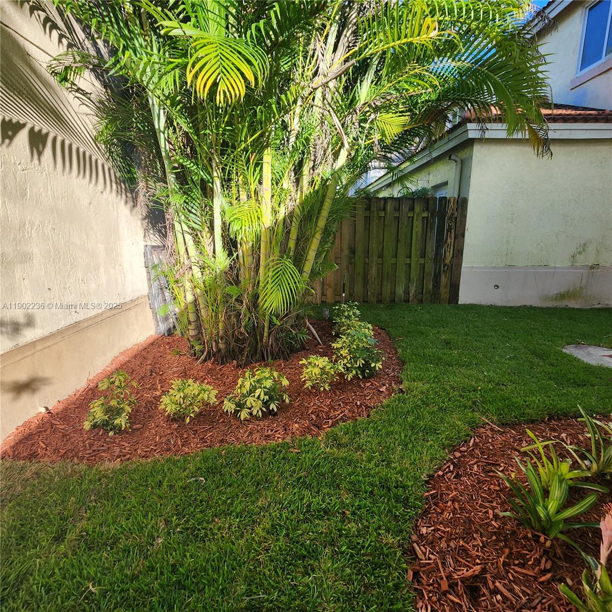 11281 Reveille Road Cooper City, FL 33026 - Photo 31 of 42 a view of a backyard with plants