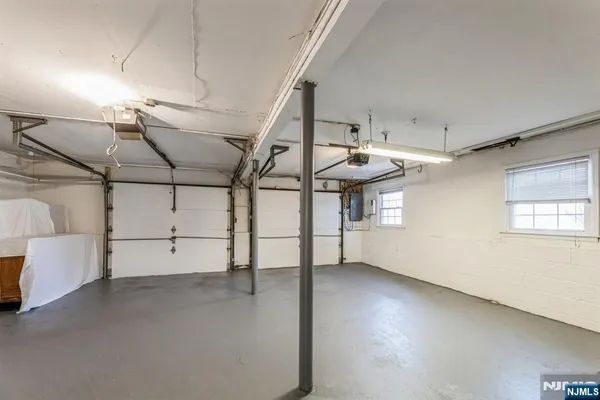 a view of big yard with large trees