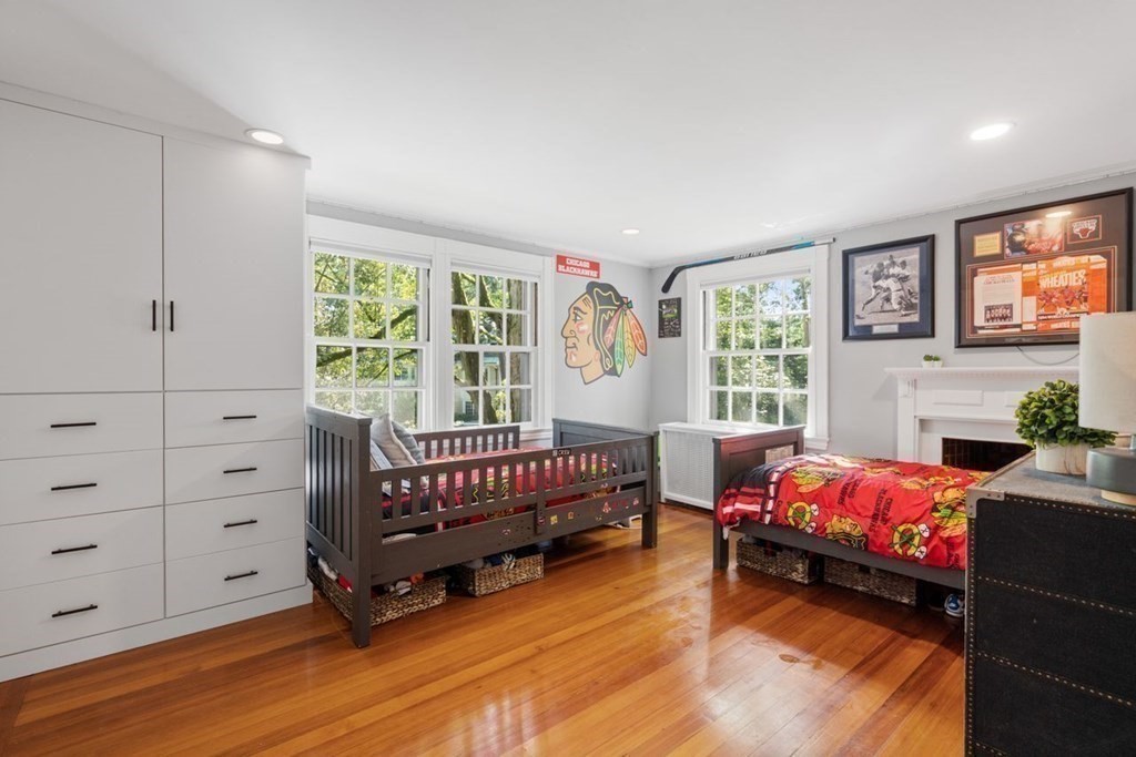 21 Windsor Road Wellesley, MA 02481 - Photo 21 of 28 a bedroom with furniture and a window