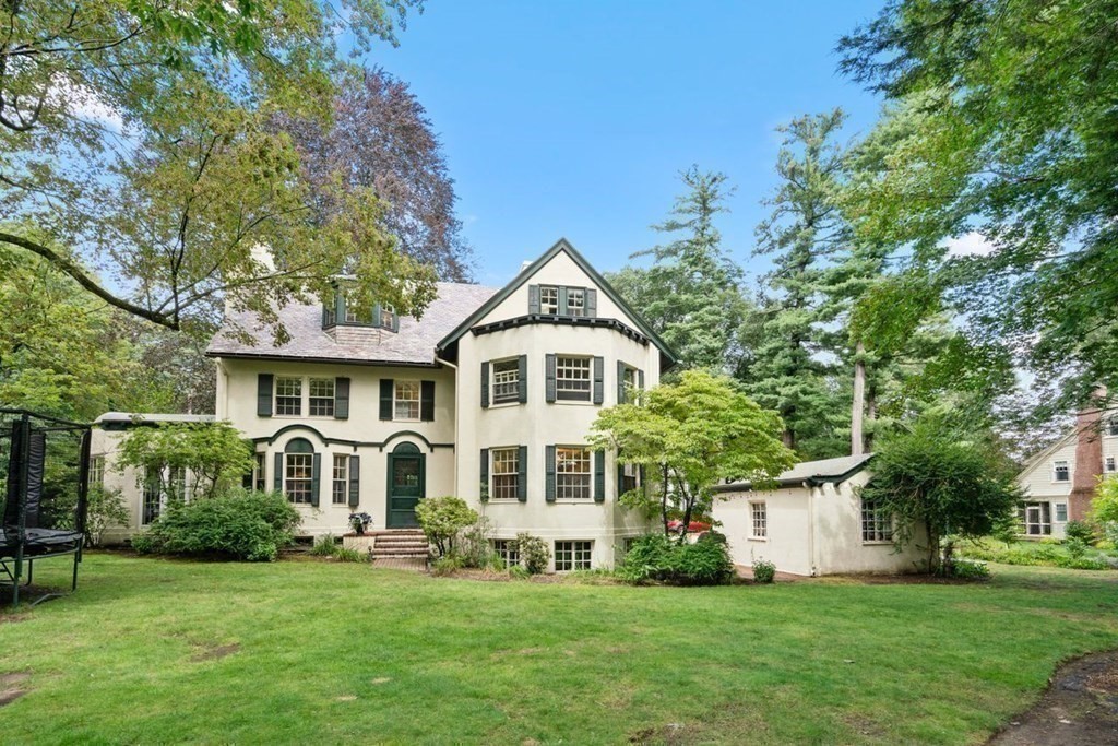 21 Windsor Road Wellesley, MA 02481 - Photo 27 of 28 a front view of a house with a yard