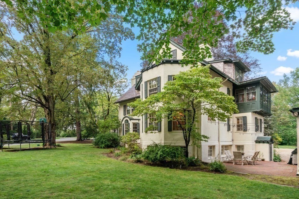 21 Windsor Road Wellesley, MA 02481 - Photo 28 of 28 front view of a house with a garden