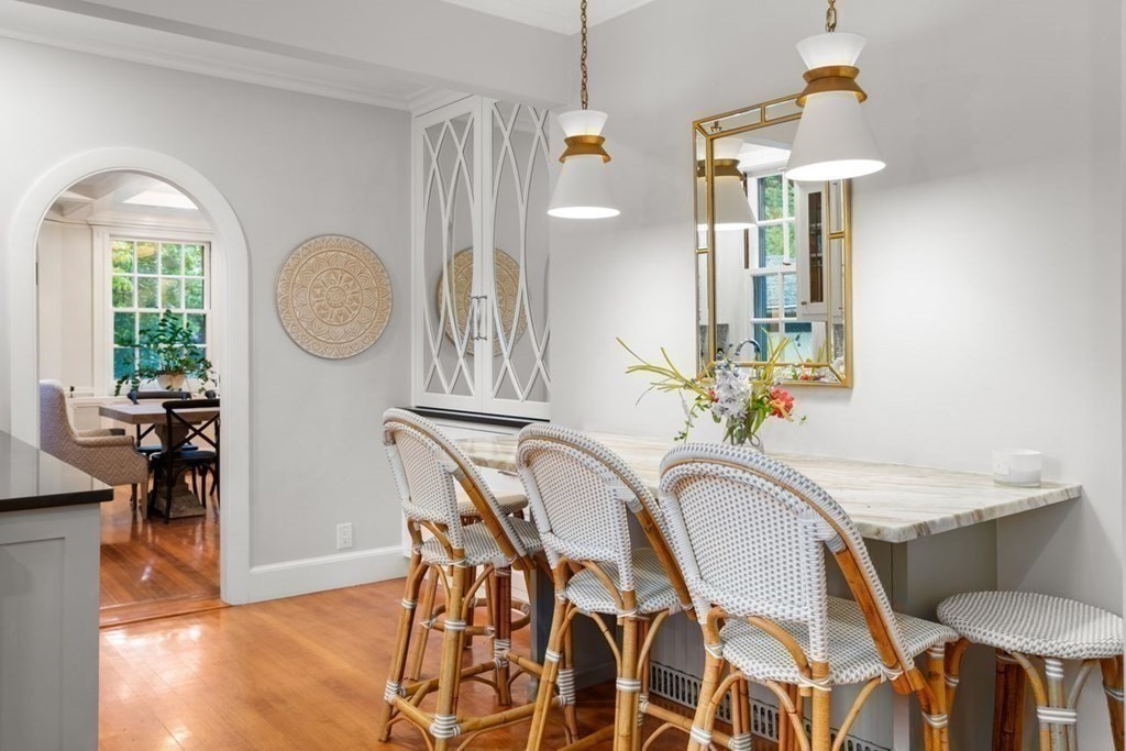 21 Windsor Road Wellesley, MA 02481 - Photo 8 of 28 a view of a dining room with furniture and chandelier