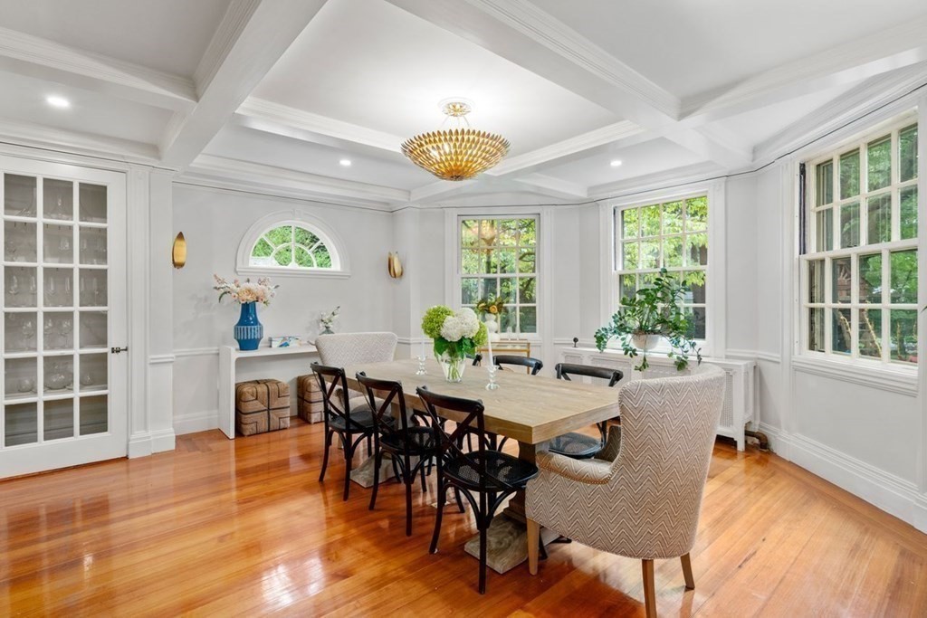 21 Windsor Road Wellesley, MA 02481 - Photo 9 of 28 a view of a dining room with furniture and a potted plant