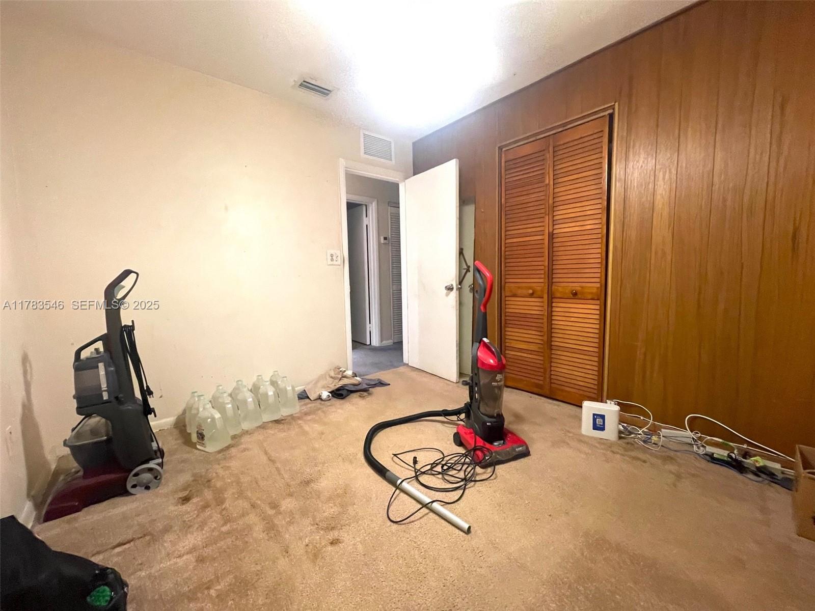 5455 Southwest 116th Avenue Miami, FL 33165 - Photo 8 of 18 a room with gym equipment