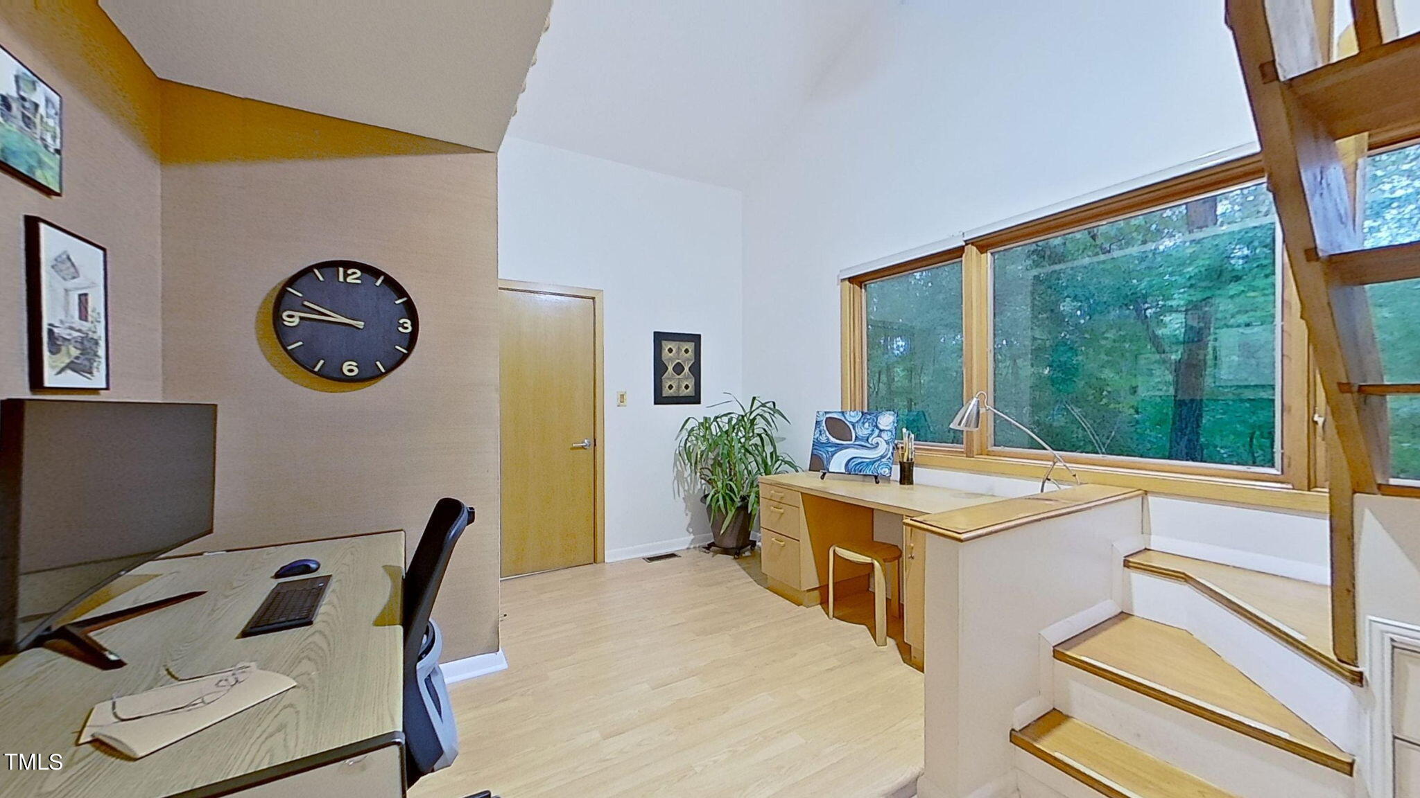 12012 Peed Road Raleigh, NC 27614 - Photo 26 of 48 a view of a workspace with furniture and a window