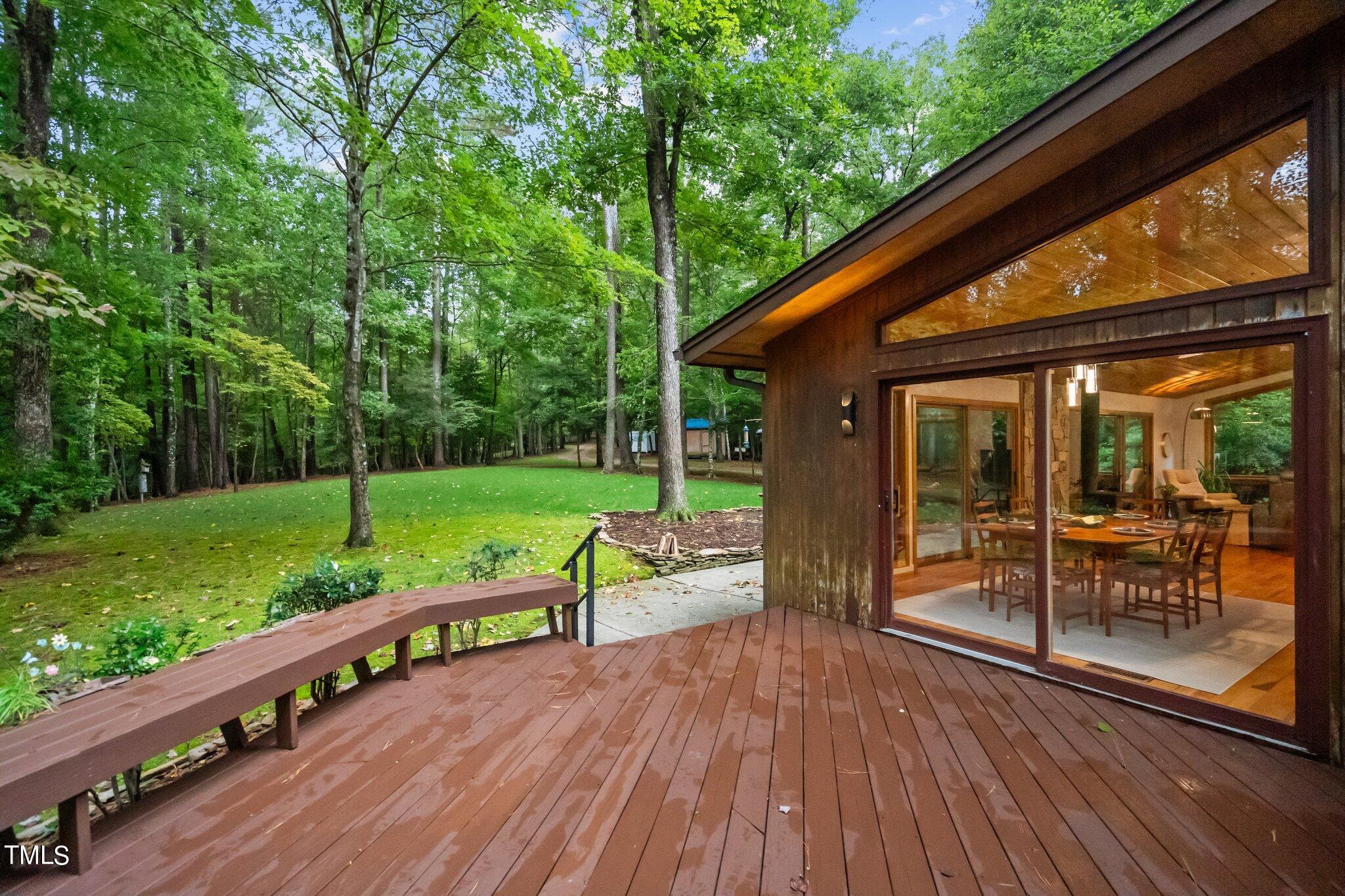 12012 Peed Road Raleigh, NC 27614 - Photo 32 of 48 a view of a deck with wooden floor and fence
