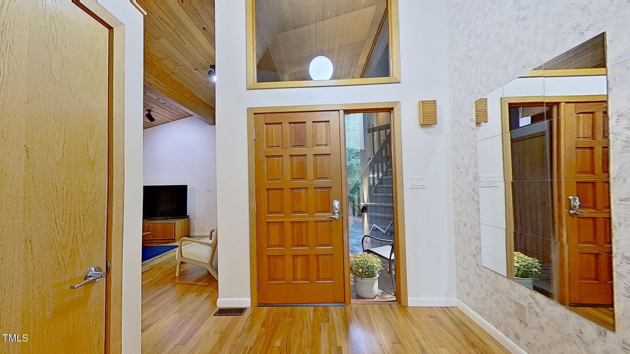 12012 Peed Road Raleigh, NC 27614 - Photo 7 of 48 a view of front door and wooden floor