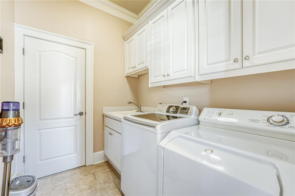 2380 Muskogee Lane Braselton, GA 30517 - Photo 30 of 30 a view of storage and utility room with washer and dryer